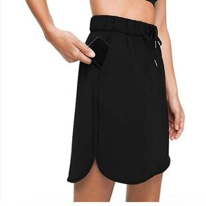 Lululemon on the fly skirt black size 6. New with out tags